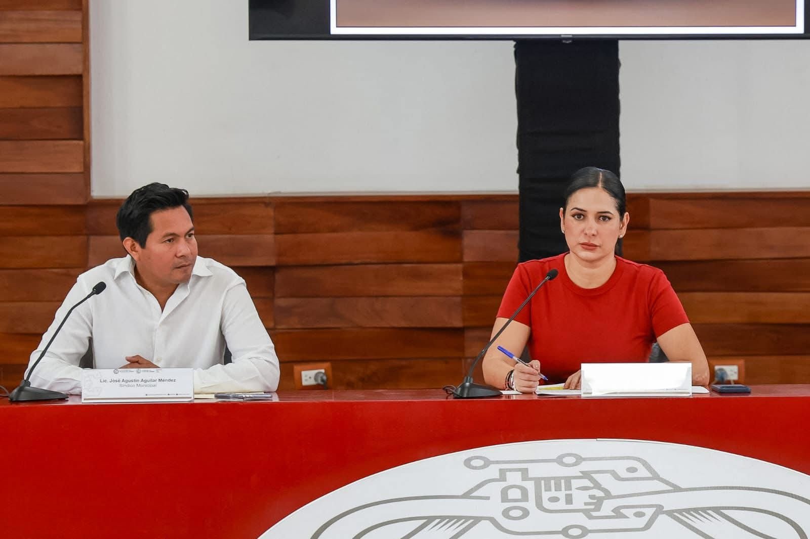 Officials discussing local initiatives during a press conference, emphasizing community engagement and development strategies.