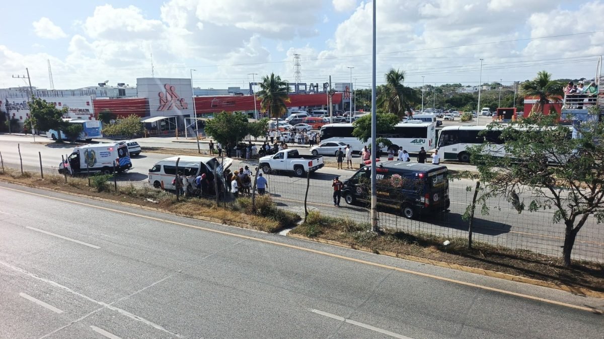 Emergency responders work at the scene of a crash in Puerto Aventuras, Quintana Roo