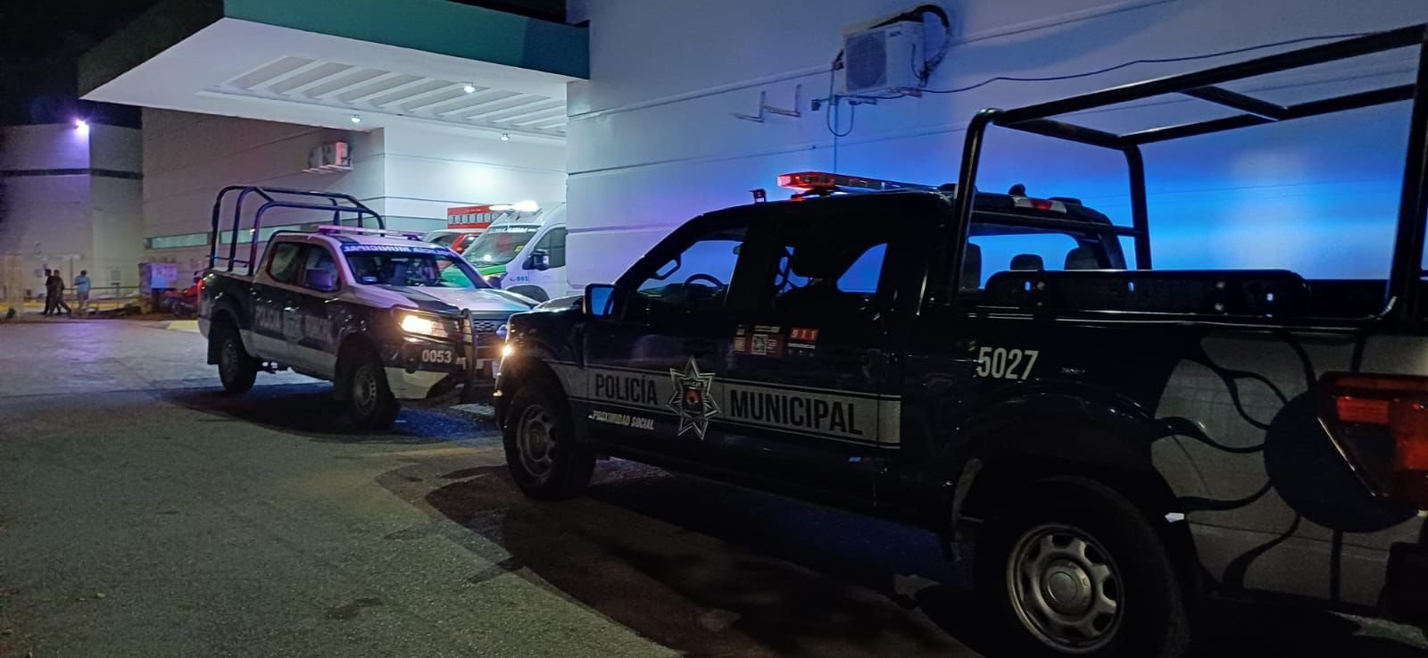 Police and emergency responders at the scene of a shooting in Puerto Morelos, Quintana Roo