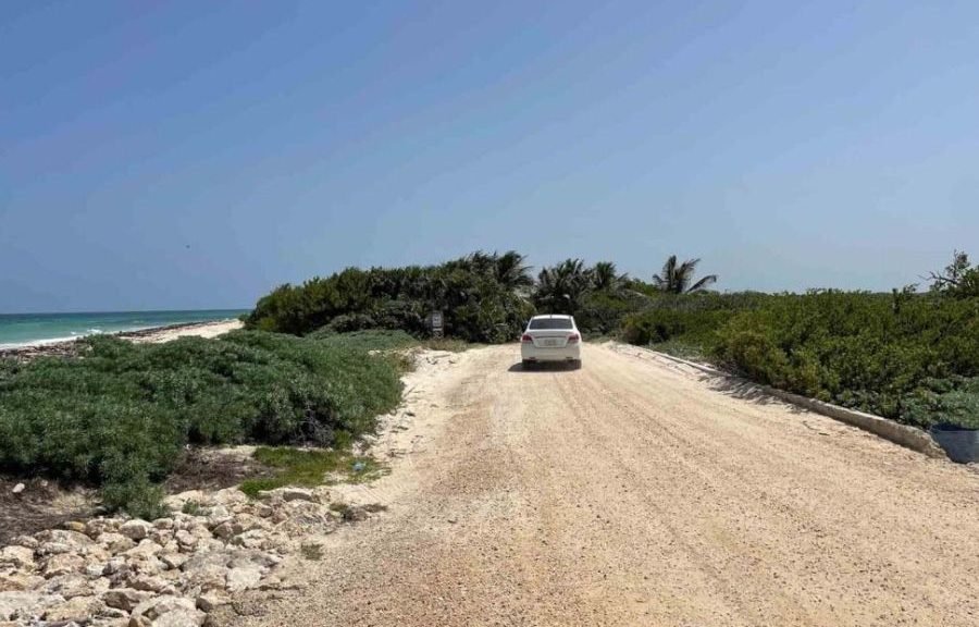 Aerial view of the deteriorated road leading to Punta Allen in Tulum, Quintana Roo