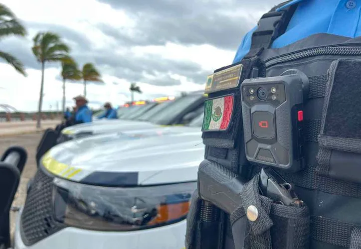 A police officer in Quintana Roo wearing a body camera during a patrol