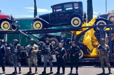 Recovered Ford Model A classic cars on a trailer after being stolen in central Mexico