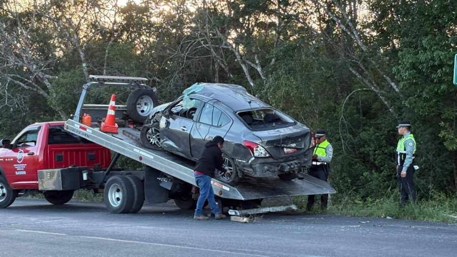 Emergency responders at the scene of a rollover crash on Federal Highway 307 near Tulum
