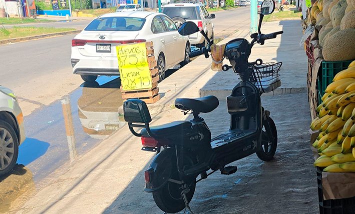 A scooter parked on a street in Quintana Roo