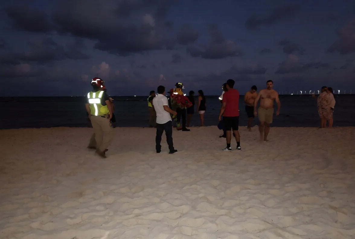 Emergency personnel conducting a search operation at Mamitas Beach in Playa del Carmen
