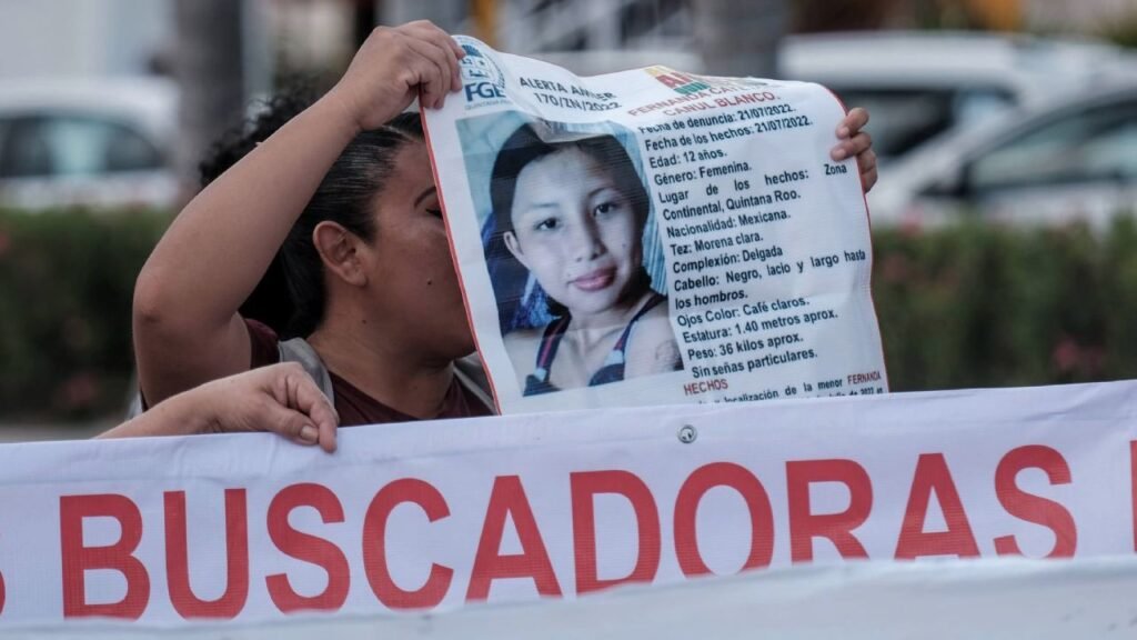 A group of searching mothers holding signs during a protest in Cancun, Quintana Roo.