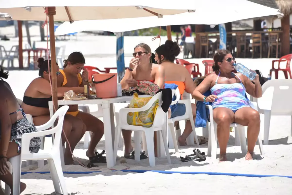 Tourists walking along the Progreso waterfront after the arrival of the Carnival Valor cruise ship