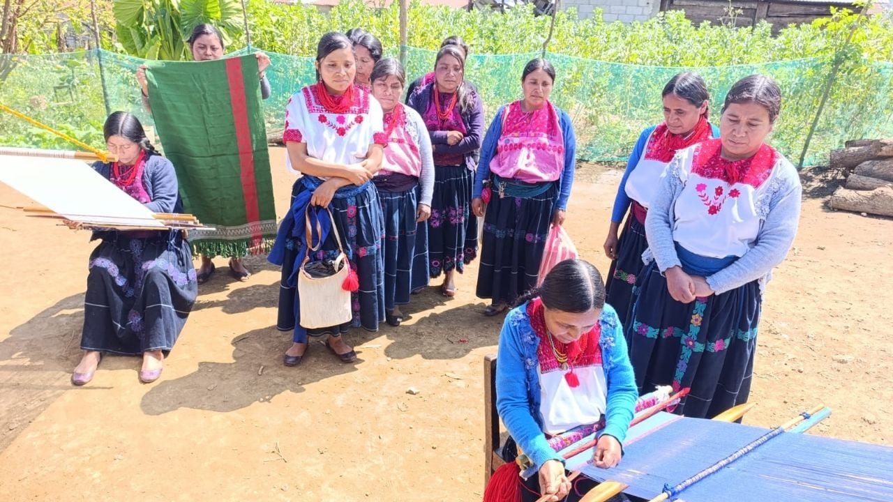 Tsotsil artisans holding textiles during a protest in San Cristobal de las Casas, Chiapas