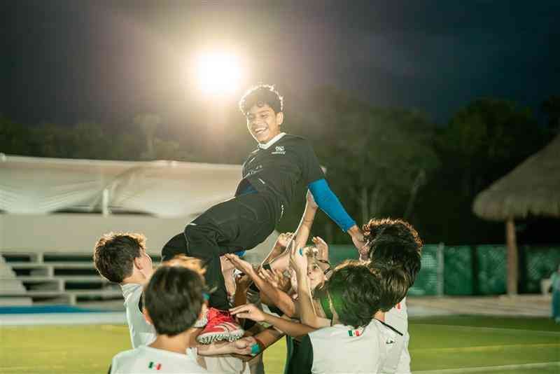 Young soccer players from Tulum Country Club pose in their uniforms