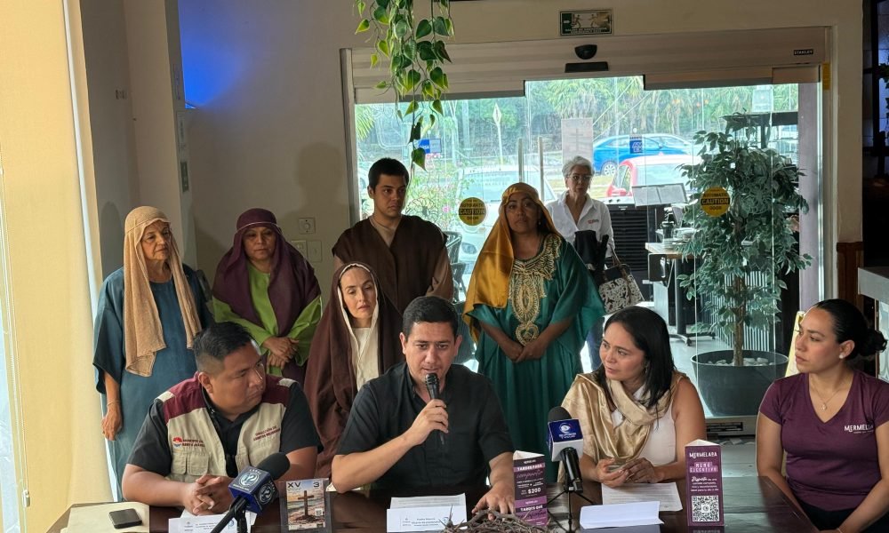 Participants in the Via Crucis performance on Playa Delfines beach in Cancún
