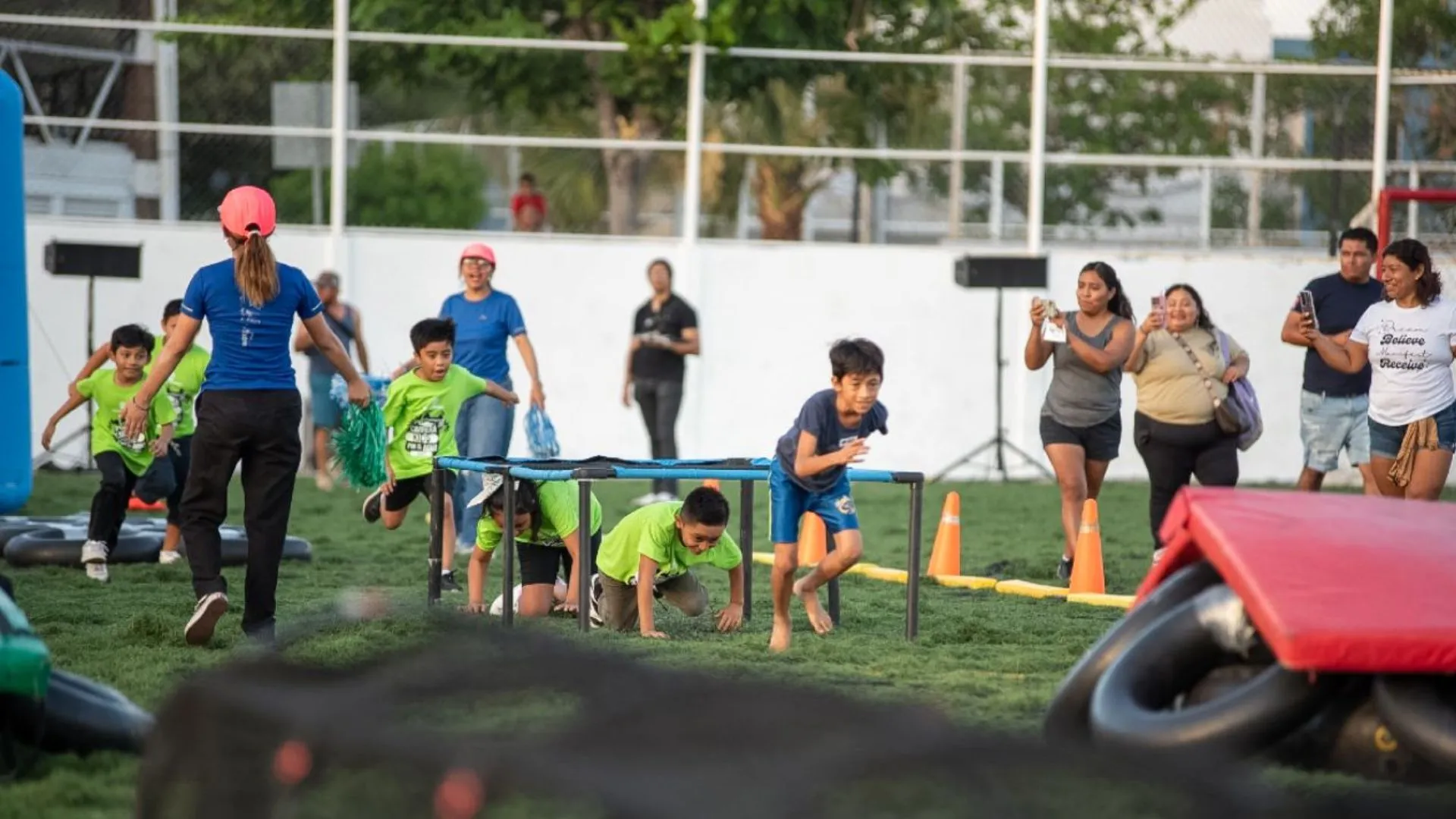 Children participating in Aguakan's water-themed festival activities in Playa del Carmen
