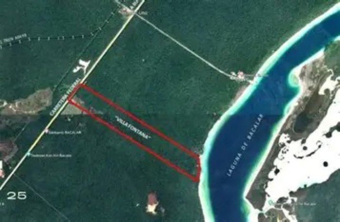 A view of Bacalar lagoon with surrounding development