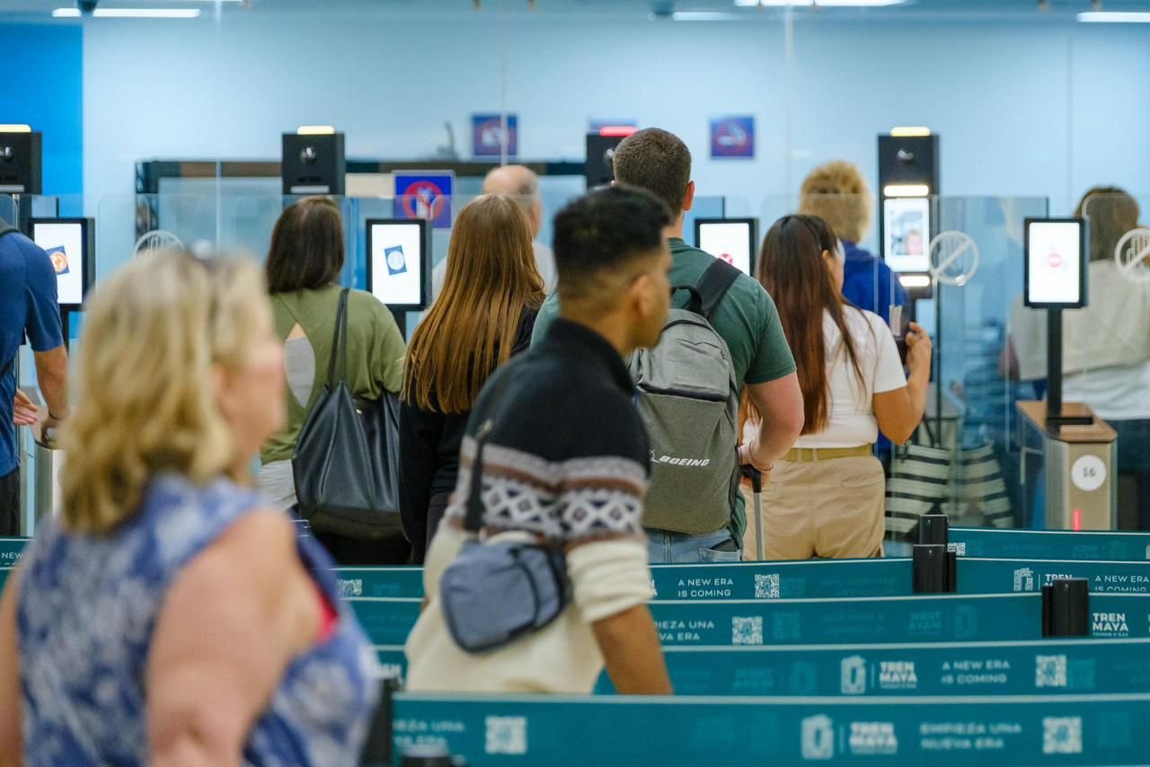 A view of Cancún International Airport with new e-gates being installed for biometric immigration control.