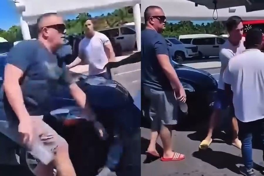 Video still showing a confrontation between a tourist and a transport worker at Cancun International Airport