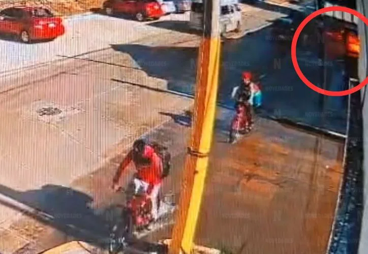Aftermath of an explosion at a commercial building on Avenida Tulum in Cancun, showing debris and emergency responders on scene.
