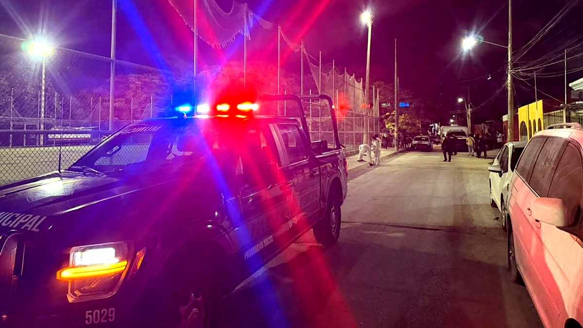 Police tape cordoning off a crime scene in a Cancun park after a woman was stabbed to death