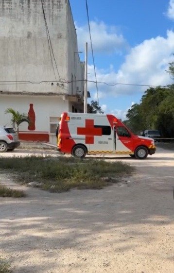 Crime scene tape on a street in Cancun after a fatal shooting on Children's Day