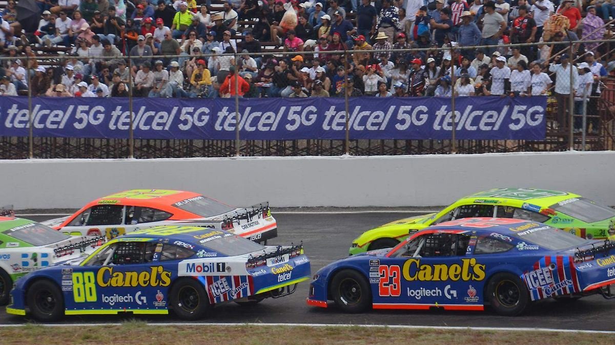 Rubén García Junior and Max Gutiérrez of Canel's Racing pose with their cars