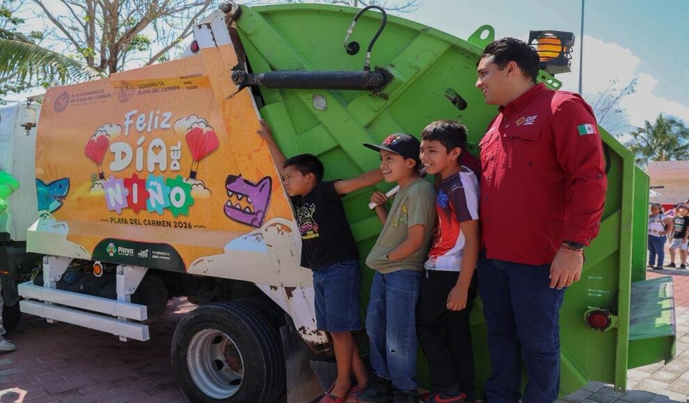 Children laughing and playing at a Children's Day event in Puerto Aventuras, Quintana Roo