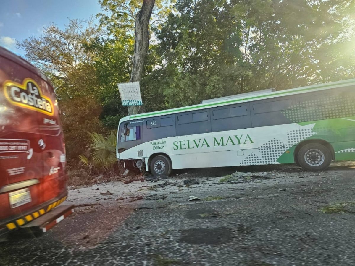 Emergency responders at the scene of a bus and truck collision on a highway in Cancun