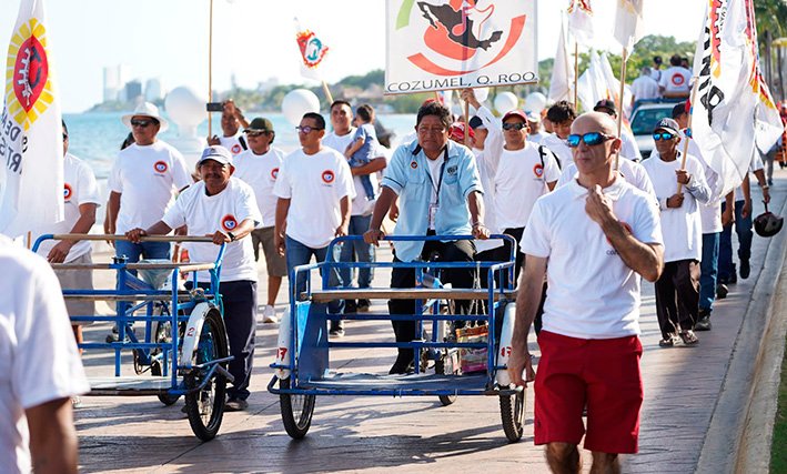Workers marching in a May Day parade in Cozumel, Quintana Roo