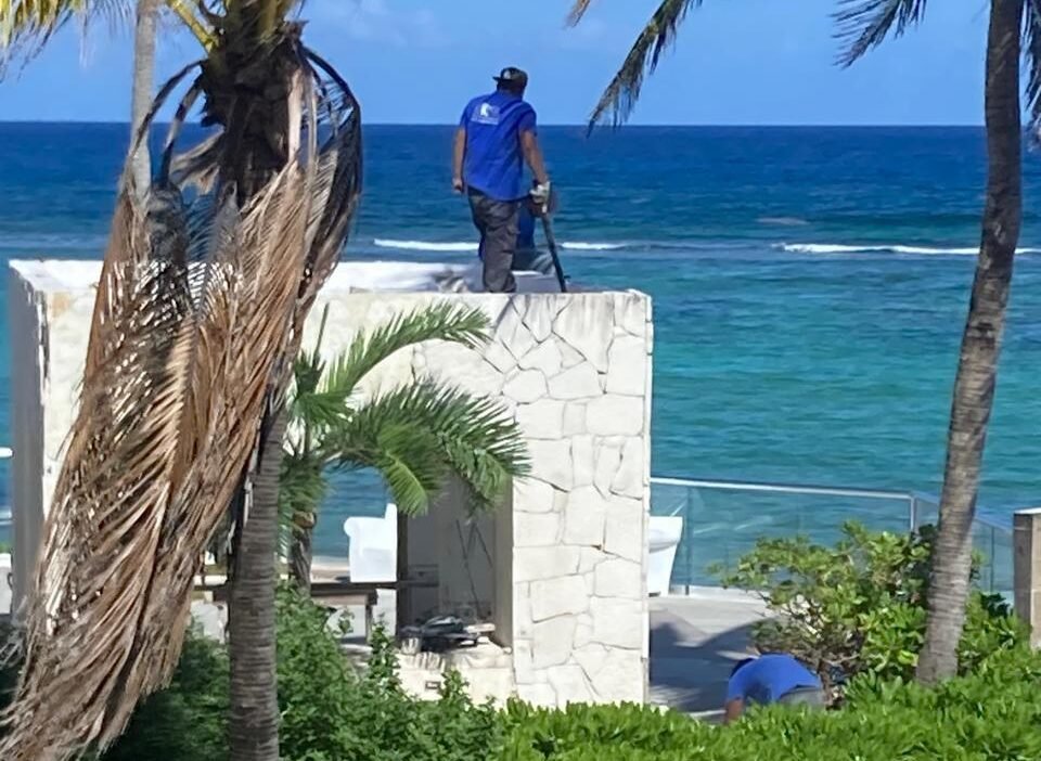 Workers demolishing a beach bar structure at the Oasis Akumal hotel complex in Akumal, Quintana Roo.
