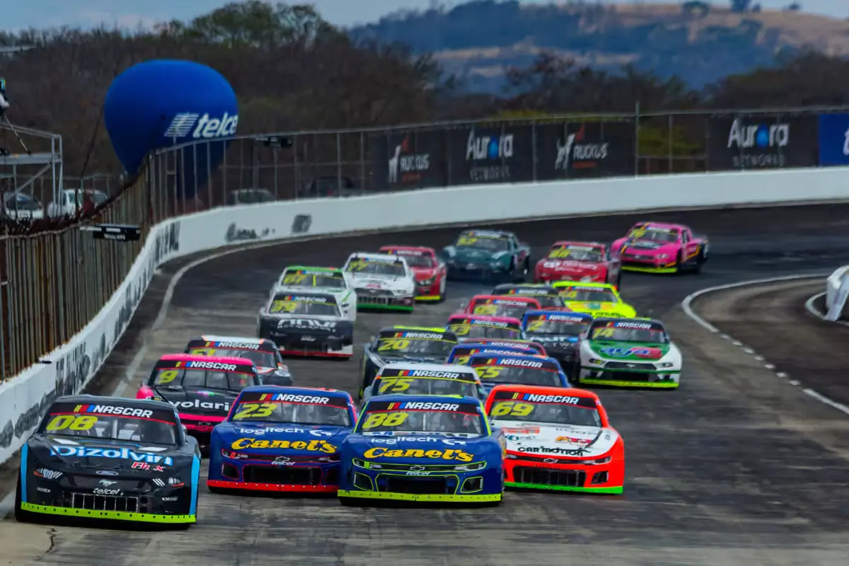 Emiliano Richards and Eloy Sebastian Falcon celebrate their wins at the temporary oval track at Tulum International Airport
