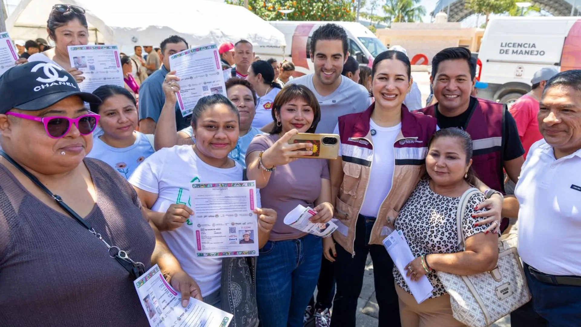 Playa del Carmen Mayor Estefanía Mercado and Senator Eugenio Segura touring service booths at the Chambamanía event in Puerto Aventuras