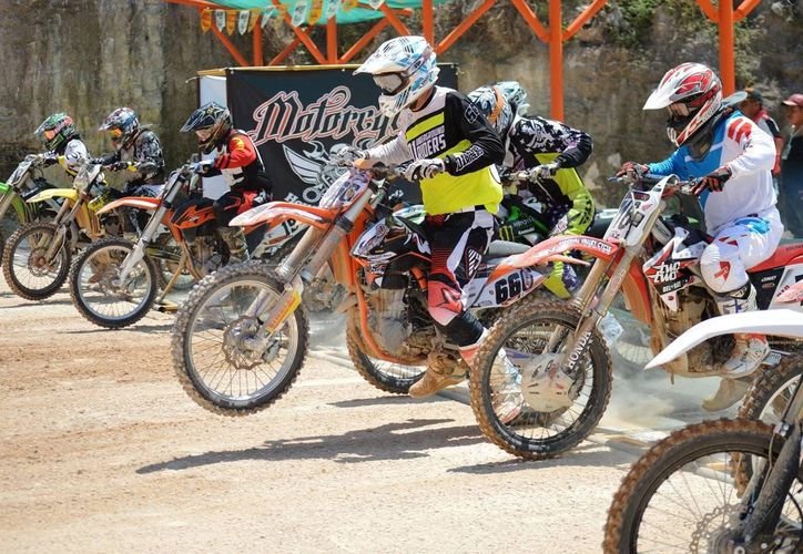 Motorcyclists performing stunts at the extreme motorcycling championship in Cancun
