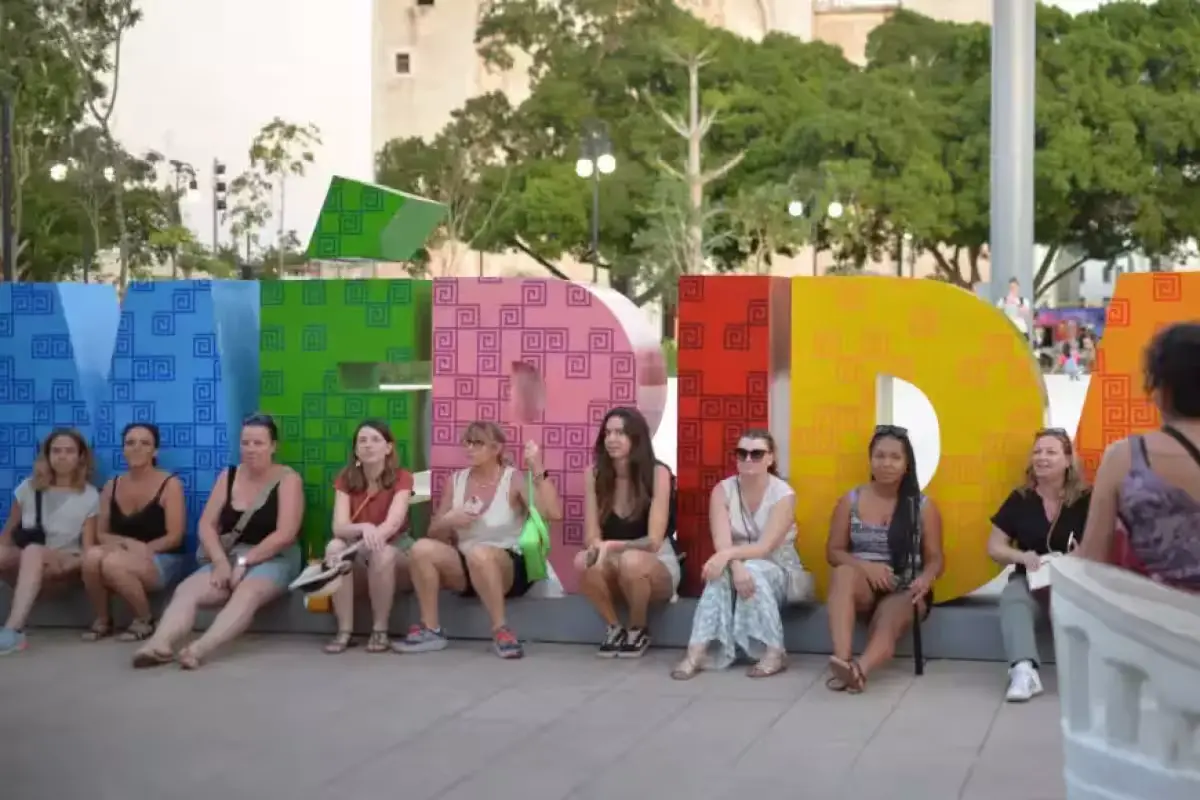 A diverse group of people representing the growing foreign community in Yucatán