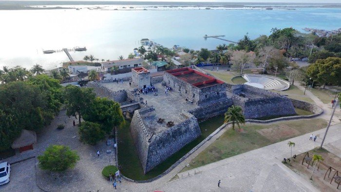 Quintana Roo Governor Mara Lezama standing outside the historic Fort of San Felipe in Bacalar