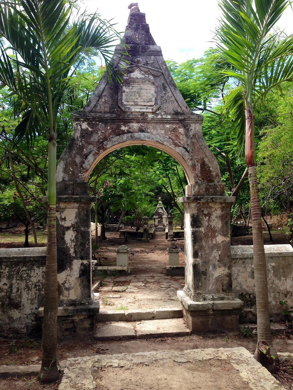 Archaeological site at Hacienda Mundaca in Isla Mujeres showing artifacts and excavation areas