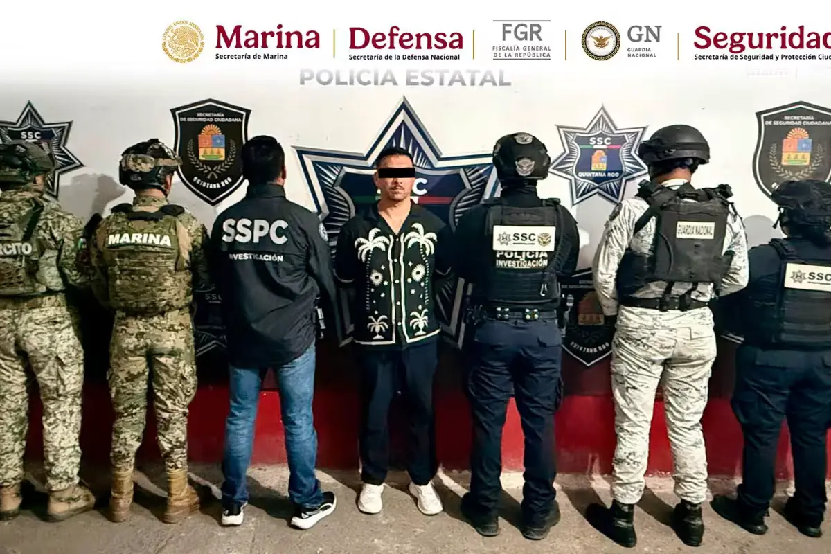 Security personnel from multiple agencies involved in the operation to capture a fugitive in Cancún