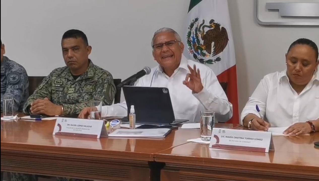 Investigators at the grave site in Leona Vicario, Quintana Roo