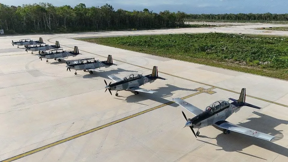 Mexican Air Force planes on the tarmac at Tulum International Airport