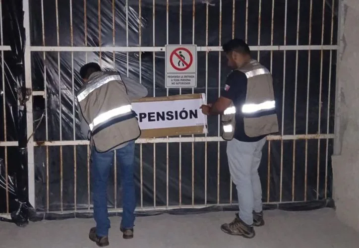 Seals of closure placed on a construction site in Playa del Carmen after workers dumped sewage into the sea