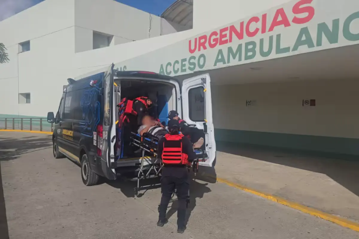 Police and emergency vehicles at the scene of a shooting in Playa del Carmen's In House neighborhood