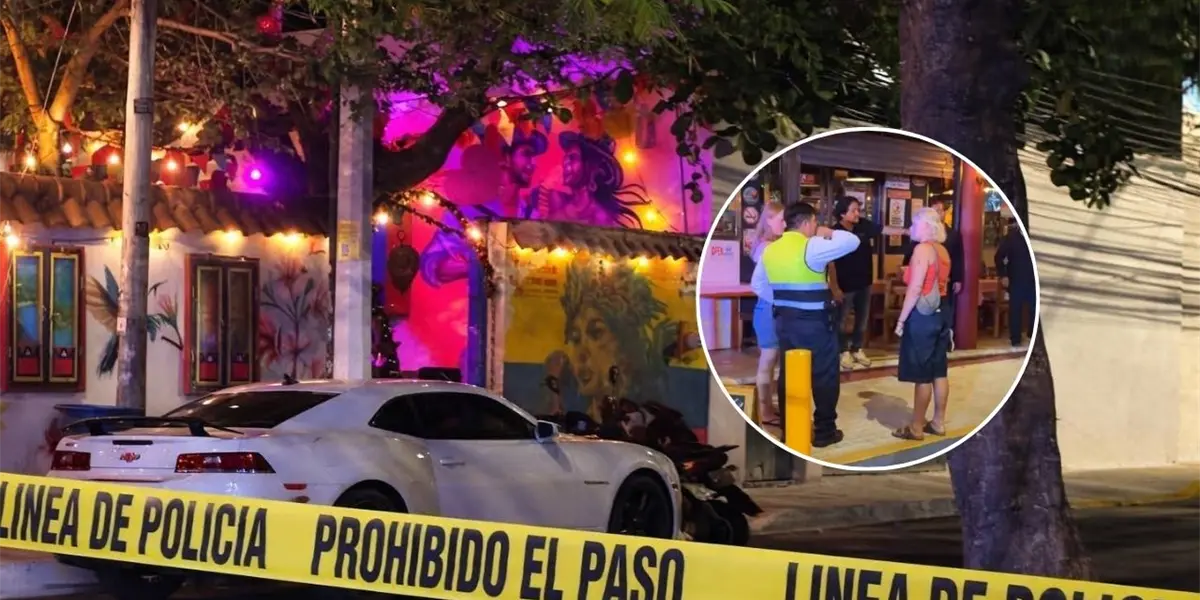 Police and forensic investigators at the scene of a shooting at a restaurant in Playa del Carmen