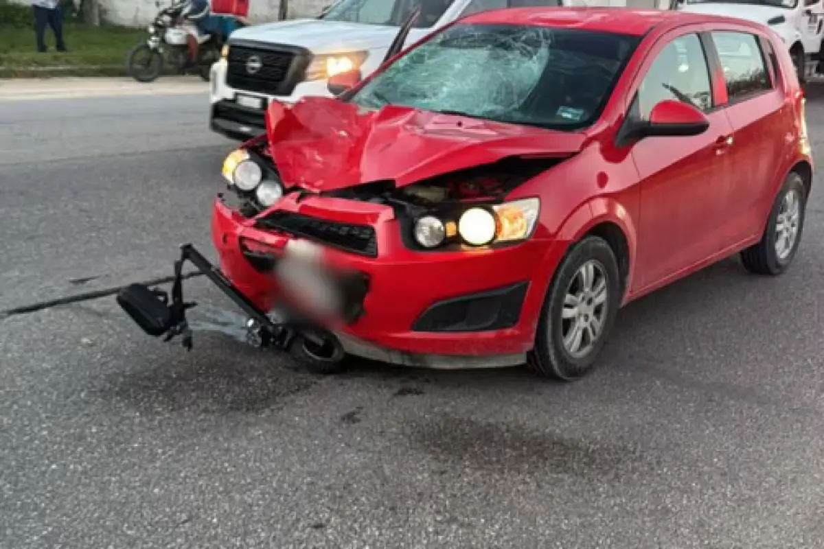 Emergency responders at the scene where a woman was fatally struck while riding a scooter in Playa del Carmen
