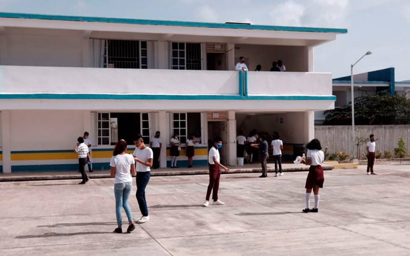 A group of students in a classroom setting, representing the youth survey in Playa del Carmen