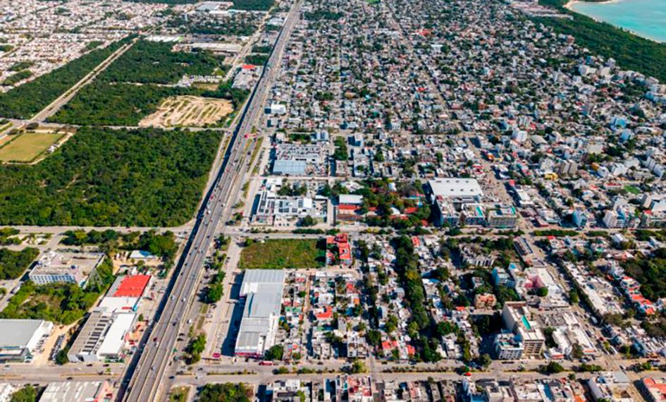 Construction workers installing new water pipes in Playa del Carmen as part of a water system upgrade project