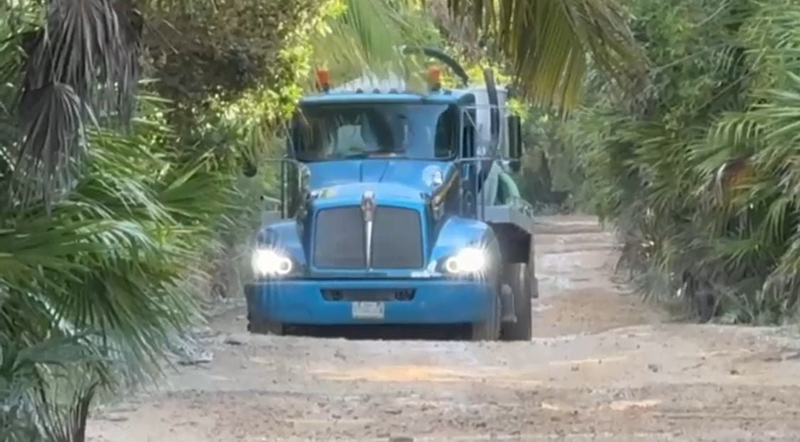 Construction machinery working on the access road to Punta Allen in Tulum, Quintana Roo