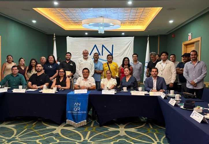 Aerial view of the El Meco swimming area in Quintana Roo, Mexico, with boats and buoys in the water