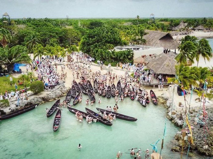 Participants in traditional attire during the Sacred Maya Crossing event in Cozumel