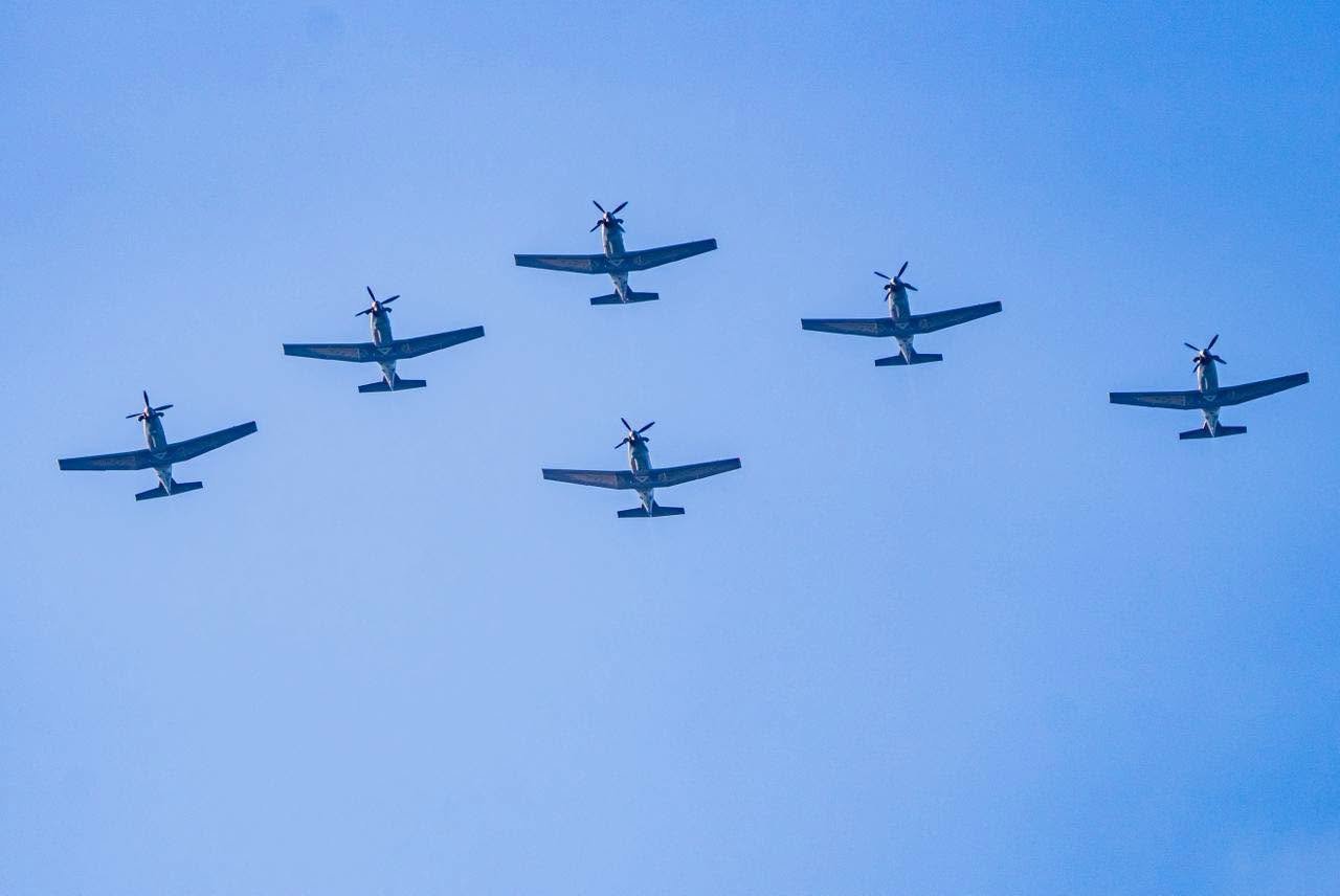 Aerial view of Tulum during the Air Show rehearsal with aircraft performing maneuvers