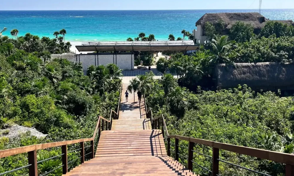 A view of Tulum's coastline, with the Jaguar Park area in the background, illustrating the tourism destination facing access restrictions.