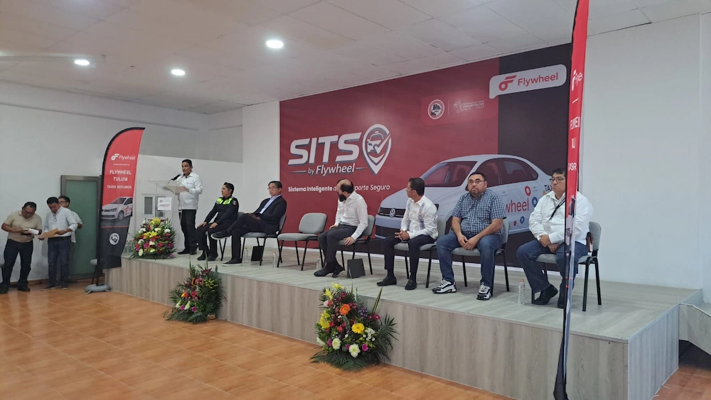 Taxi union members and officials gather at a meeting in Tulum to discuss the new digital platform