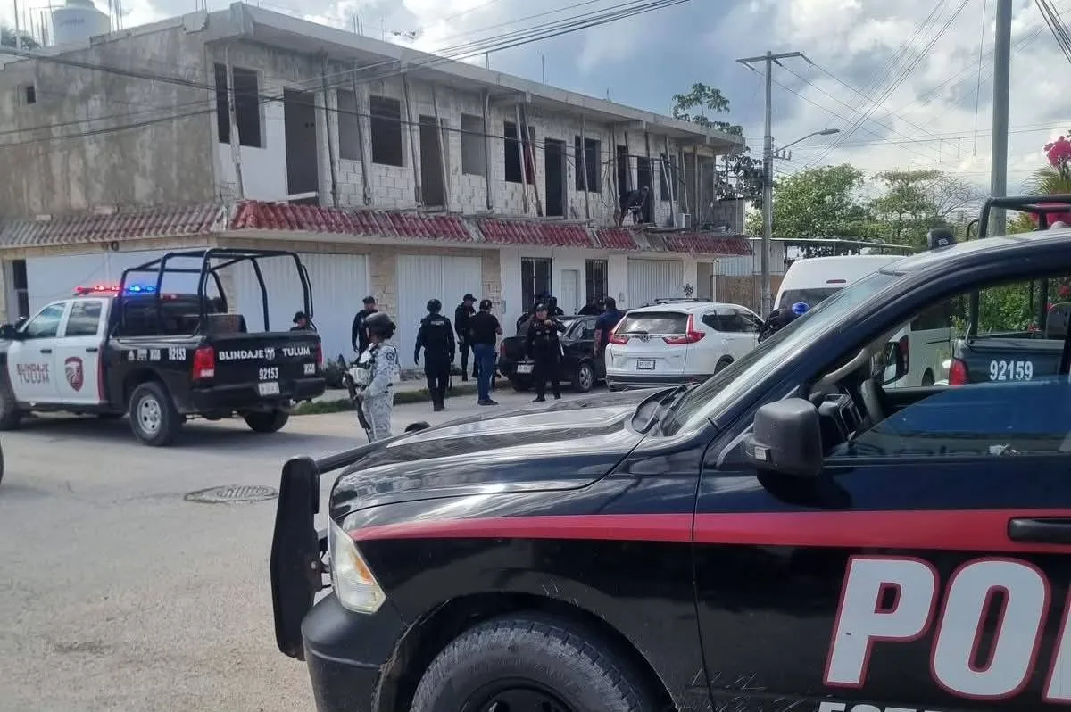 Police officers cordoning off an area near the Gran Aston hotel in Tulum after a shooting incident