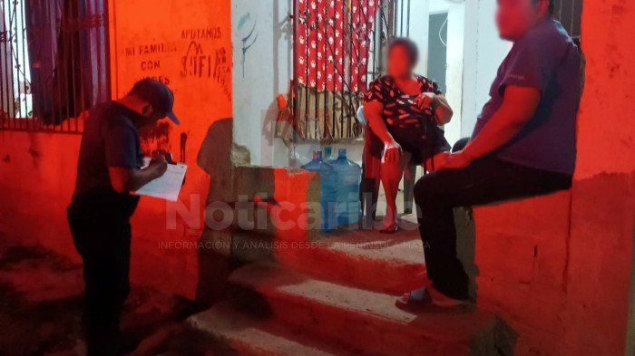 Emergency responders attend to an elderly woman after fumigation chemical exposure in Jose Maria Morelos