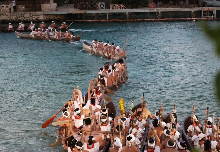Entrance to Xcaret park featuring traditional Mayan architectural elements